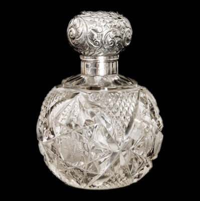Lot 124 - A Victorian silver-mounted large cut glass ovoid scent bottle by William Neale.