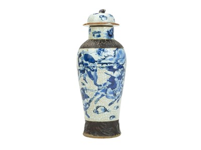Lot 397 - A Chinese blue and white crackle glaze vase and cover.