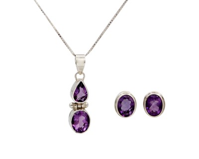 Lot 87 - A silver set of an amethyst pendant necklace and a pair of stud earrings, boxed.