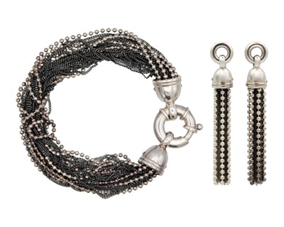 Lot 85 - A two-tone silver multi-row chain bracelet with a matching pair of tassel stud earrings.