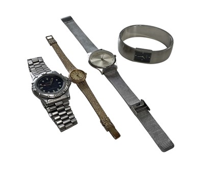 Lot 93 - Four fashion watches.