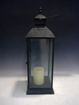 Lot 151 - A Metal Candle Lantern. The Lantern is 72cm...