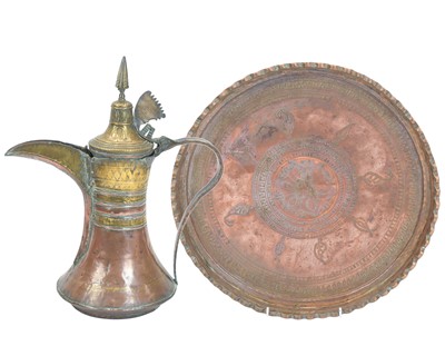 Lot 404 - A copper and brass dallah coffee pot.