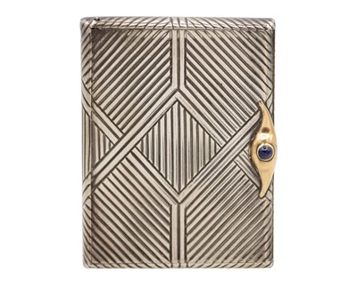 Lot 194 - A Russian silver, gold, and sapphire cigarette case, circa 1900.