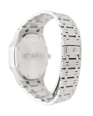 Lot 1007 - AUDEMARS PIGUET - A Royal Oak Dual Time Power Reserve stainless steel gentleman's bracelet watch.