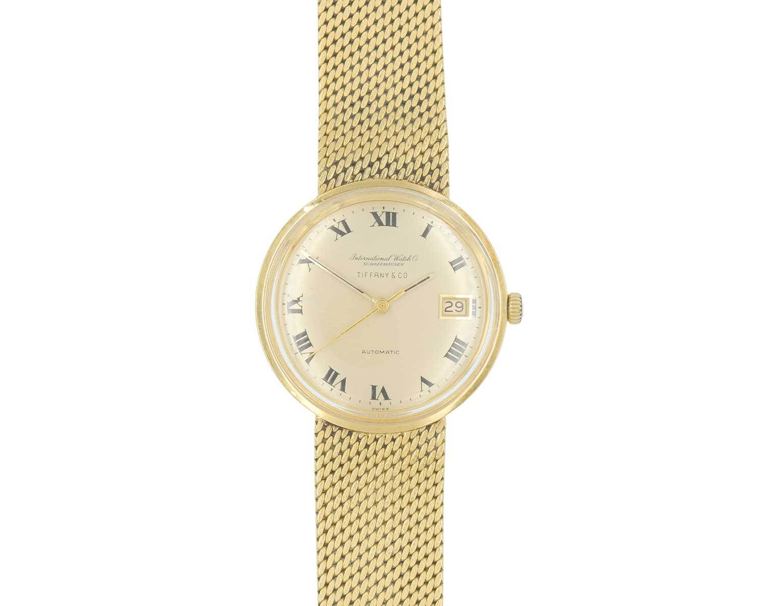 Lot 1024 - INTERNATIONAL WATCH CO, FOR TIFFANY & CO- A fine 18k automatic gentleman's bracelet wristwatch.