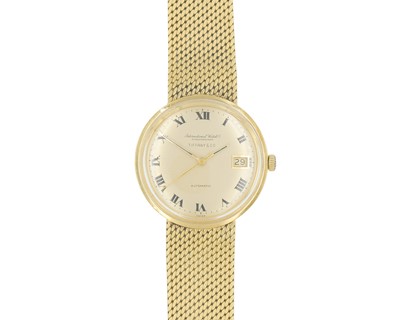 Lot 1024 - INTERNATIONAL WATCH CO, FOR TIFFANY & CO- A fine 18k automatic gentleman's bracelet wristwatch.