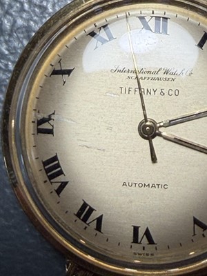 Lot 1024 - INTERNATIONAL WATCH CO, FOR TIFFANY & CO- A fine 18k automatic gentleman's bracelet wristwatch.