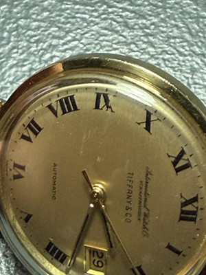 Lot 1024 - INTERNATIONAL WATCH CO, FOR TIFFANY & CO- A fine 18k automatic gentleman's bracelet wristwatch.