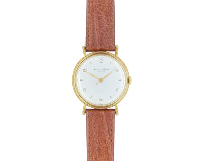 Lot 1023 - INTERNATIONAL WATCH CO - An 18k manual wind gentleman's dress wristwatch.