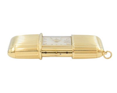 Lot 1078 - MOVADO - A rare 18k yellow gold purse watch.