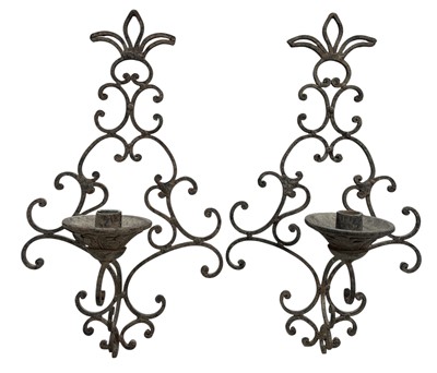 Lot 168 - A pair of wrought iron Parisian-style candle...