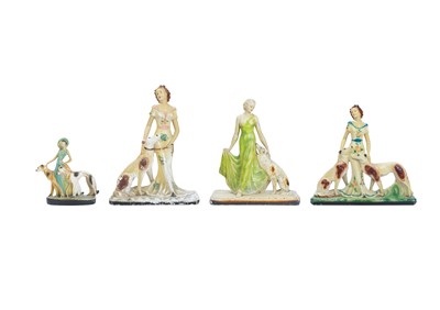 Lot 736 - Four Art Deco hand painted chalk ware figure groups.