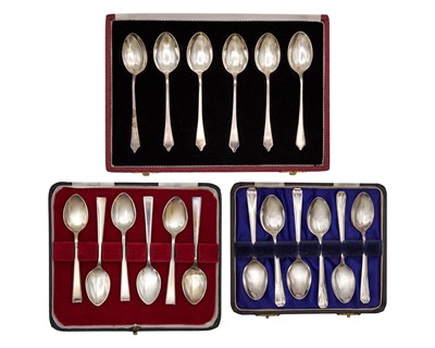 Lot 169 - A selection of three cased hallmarked silver sets of six coffee and tea spoons.
