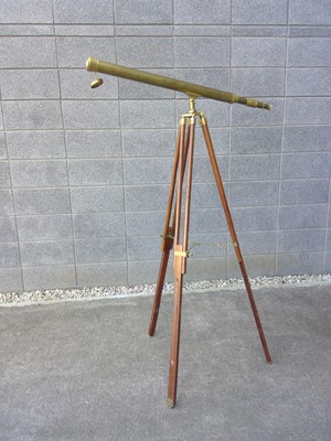 Lot 187 - A Brass Telescope and Tripod. The height is...