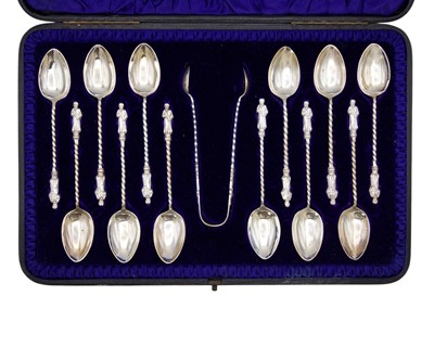 Lot 126A - A Victorian cased set of twelve silver Apostle teaspoons and sugar tongs by Edward Barnard & Sons Ltd.