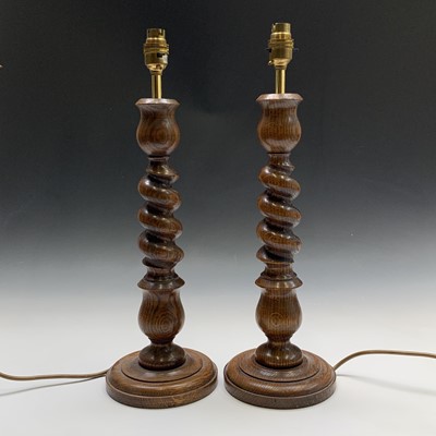 Lot 97 - A pair of oak barley twist and acanthus design...