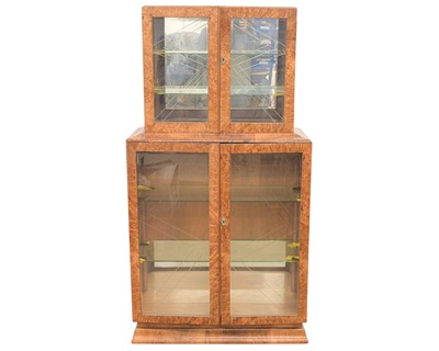 Lot 710 - A continental Art Deco display cabinet.