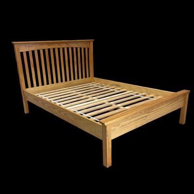 Lot 25 - A Pine Double Bed Frame. The Frame measures...