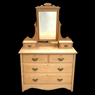 Lot 38 - A Stripped Oak Dressing Table. The piece...