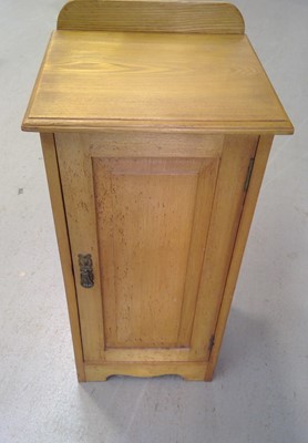 Lot 58 - An Oak Pot Cupboard. The Cupboard is 77cm tall,...
