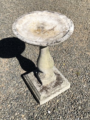 Lot 244 - A Haddonstone birdbath with shallow top, on a...