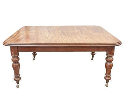 Lot 941 - A Victorian mahogany extending dining table.