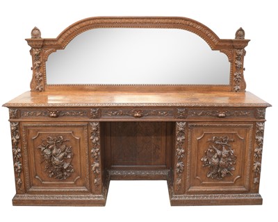 Lot 925 - A large Victorian carved oak mirror back sideboard.