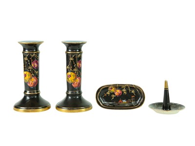 Lot 48 - A Victorian ironstone vase of hexagonal form, together with a pair of matching smaller vases.