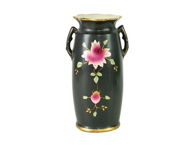 Lot 48 - A Victorian ironstone vase of hexagonal form, together with a pair of matching smaller vases.