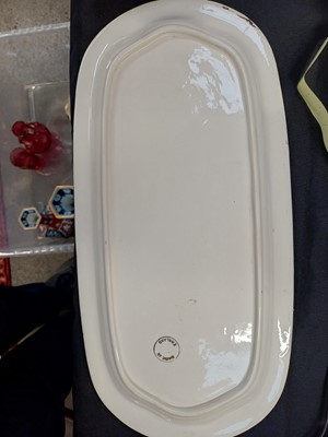 Lot 48 - A Victorian ironstone vase of hexagonal form, together with a pair of matching smaller vases.