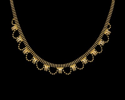Lot 89 - An Italian 18k gold bead 16" choker necklace.