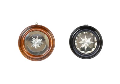 Lot 824 - Two circular sunburst sorcerer mirrors.