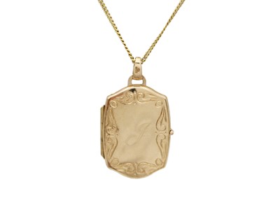Lot 98 - A 9k gold locket pendant on a fine curb chain.