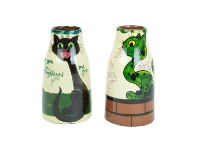 Lot 735 - Two Tor Vale cat vases.