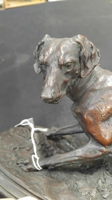 Lot 47 - After Pierre-Jules Mene (1810-79), a patinated bronze figure of a crouching gundog.