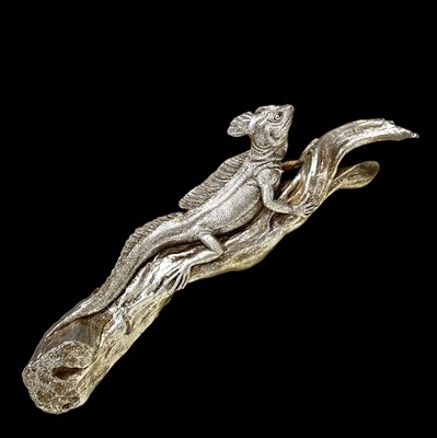 Lot 72 - A painted wooden lizard, 45cm long.