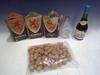 Lot 169 - A box containing dimple bottles, corks, and a...