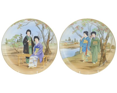 Lot 431 - A pair of Japanese painted porcelain chargers.