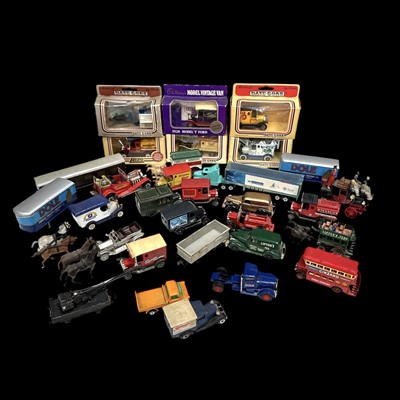 Lot 81 - A selection of toy cars.