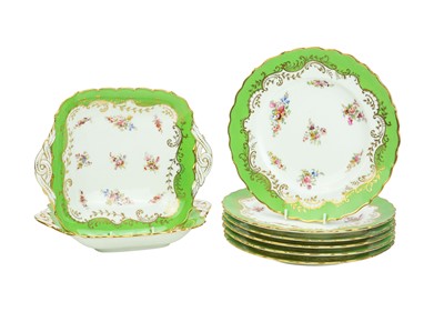 Lot 596 - A Coalport apple green and gilt bone china part dessert service.