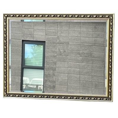 Lot 96 - A large gilt-framed bevel edge wall mirror....