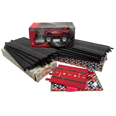 Lot 113 - A selection of Boxed Scalextric track with an...