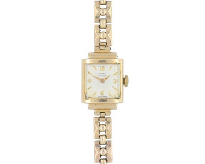Lot 1002 - A 1950's 9k lady's manual wind bracelet wristwatch.