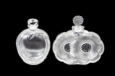 Lot 536 - Two Lalique glass perfume bottles.