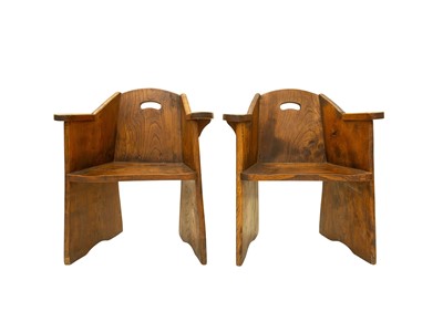 Lot 700 - A pair of rustic elm chairs.