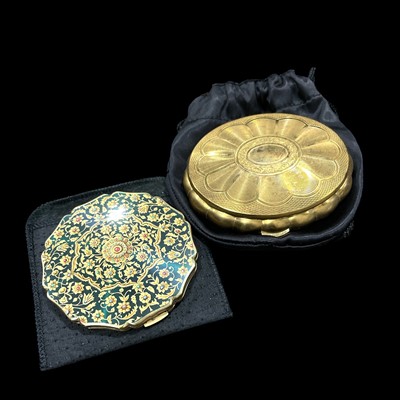Lot 162 - A collectable Kigu musical compact and a 1950s...
