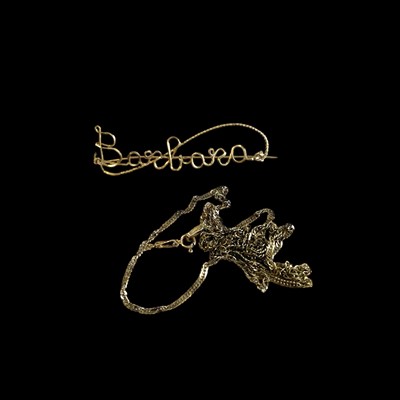 Lot 166 - A broken 9ct gold necklace and a yellow metal...