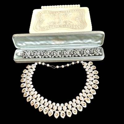 Lot 167 - A faux pearl necklace, 40cm long and a paste...