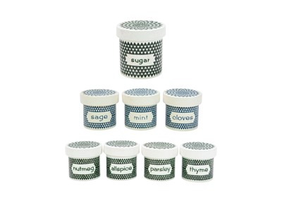 Lot 674 - A matched group of eight Poole Kitchen storage jars and covers.